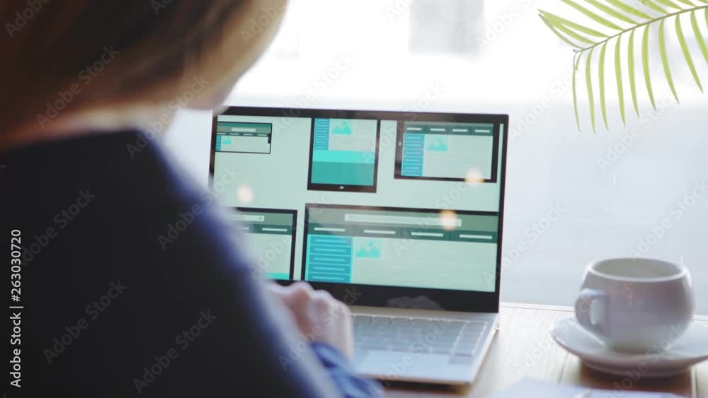 Canvas Prints over the shoulder view of unrecognizable freelance female website designer creating templates for di
