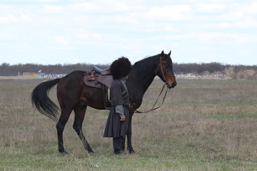 Race horses and riders on them.