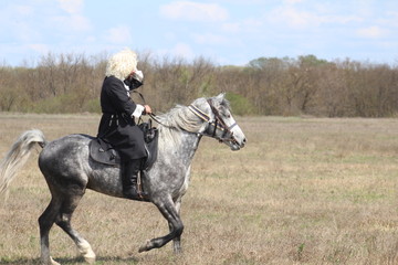 Race horses and riders on them.