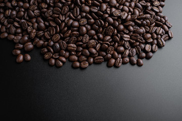 Coffee beans on black background