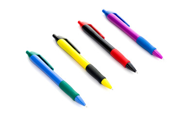 Set of four office pens on a white background