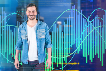 Smiling young programmer, graphs and code