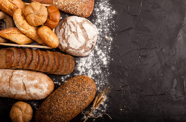 Assortment of baked goods on dark background