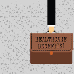 Word writing text Healthcare Benefits. Business photo showcasing monthly fair market valueprovided to Employee dependents Businessman Hand Carrying Colorful Briefcase Portfolio with Stitch Applique