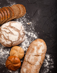 Assortment of baked goods on dark background