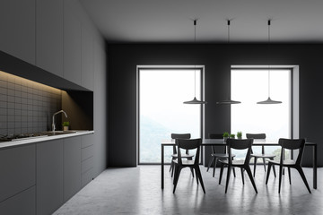 Loft gray kitchen with table and countertops