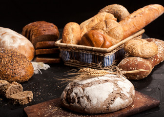 Assortment of baked goods on dark background
