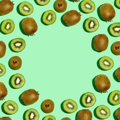 Square frame of kiwi fruits overhead view flat lay