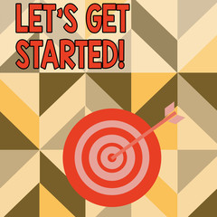 Word writing text Let S Get Started. Business photo showcasing encouraging someone to begin doing something Color Dart Board in Concentric Style with Arrow Hitting the Center Bulls Eye