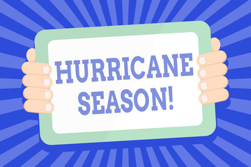 Text sign showing Hurricane Season. Business photo text time when most tropical cyclones are expected to develop Color Tablet Smartphone with Blank Screen Handheld from the Back of Gadget
