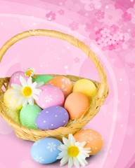 Easter basket filled with colorful eggs on a white background