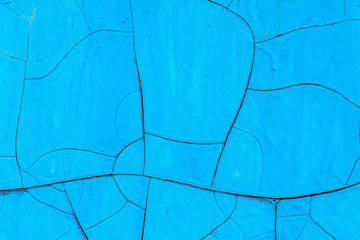 Blue old cracked rusty damaged painted metal background texture close-up