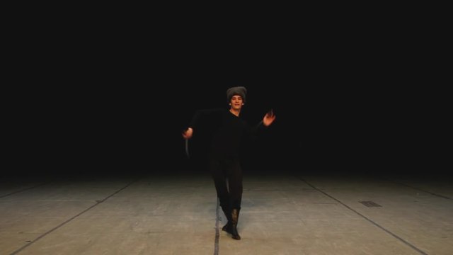 Guy dancing with swords