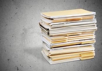 Stack of business documents on  background