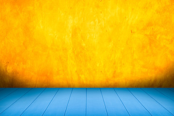 Blue Wood shelf table isolated on a yellow cement backgrounds, for display products.