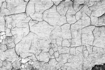 Black and white gray old cracked rusty damaged painted metal background texture close-up