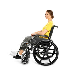 Portrait of beautiful woman in wheelchair isolated on white