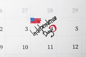 Calendar with inscription "Independence Day" and USA flag drawing, top view