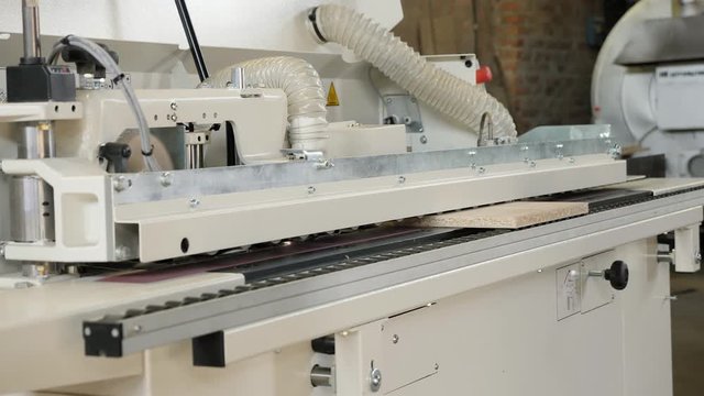 Single sided automatic edge bander on factory