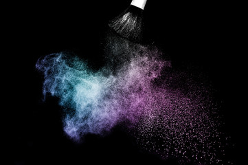 purple and blue ocean powder color splash and brush for makeup artist or graphic design in black background, look like a lively and joyful mood.