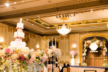 Wedding cake and candle with flower decorate