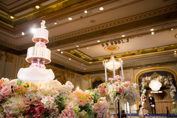 Wedding cake and candle with flower decorate