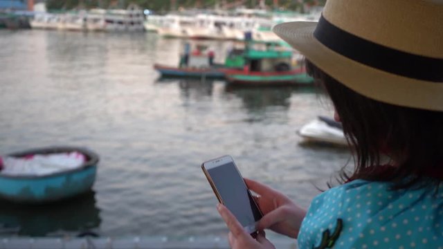 woman using mobile phone  in Phu Quoc, Vietnam