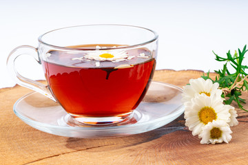 cup of tea with chamomile flowers