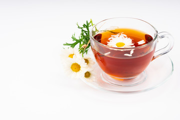 cup of tea with chamomile flowers