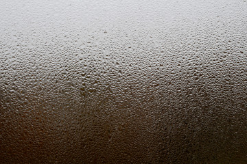 Drops of water on the glass