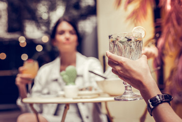 Selective focus of a glass with cocktail