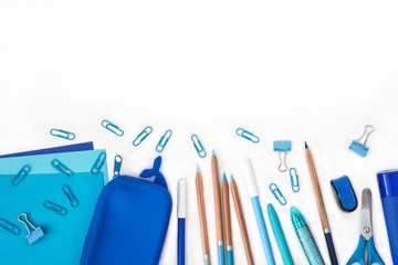 Stationery composition . Back to school. Paper sheets notepad pencils multicolor pen sharpener pencil case scissors . Objects on white background