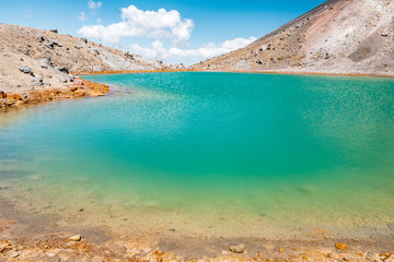 Beautiful Landscape view of Tongariro Crossing track on a beautiful day with blue sky, North Island, New Zealand.