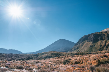 Beautiful Landscape view of Tongariro Crossing track on a beautiful day with blue sky, North Island, New Zealand.