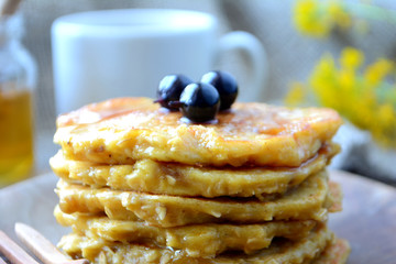 Stack of oatmeal pancake with honey and berries Healthy delicious breakfast