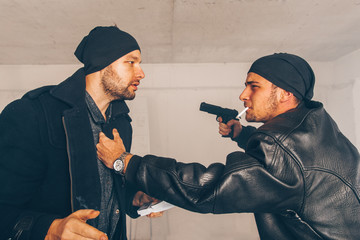 Angry robbers having a fight