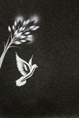 Illustration d'une colombe et d'un épi sur une pierre tombale. / Illustration of a dove and an ear...