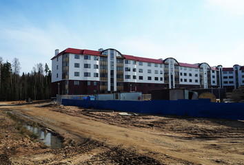 Obraz premium Construction of an apartment building. Construction of modern housing for different people. Details and close-up.