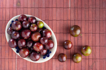 fruits of jaboticaba in bowl on the table