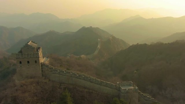 Great Wall of China at Sunset in Spring. Badaling. Aerial View. Drone Flies Forward. Medium Shot
