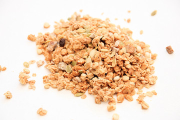 Crispy muesli dry Breakfast isolated on white background selective focus, top view