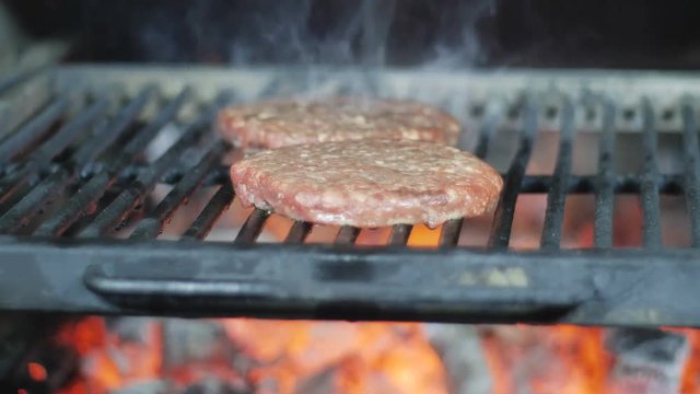 Grilled burger cutlet beef minced meat patties or frikadeller in a pan. Street food, close up