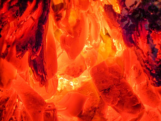 Fire on a black background. Burning coals and flames.
