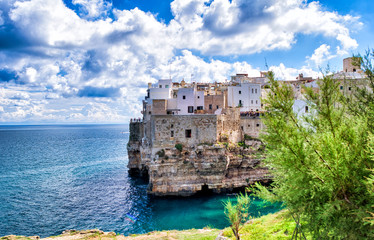 Polignano a Mare - Apulia, Italy. Beautiful aerial view of cityscape and coastline on a beautiful summer day