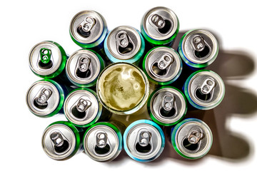  aluminum cans of beer stand in rows on a light background