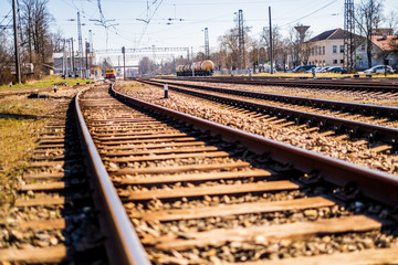 Wide track train tracks isolated with a blurred background