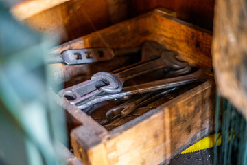 Old rustic tools in a box isolated 