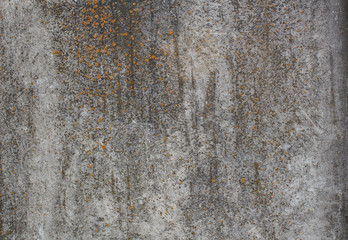Grey old grunge wall of a house, urban background
