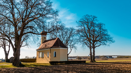 Fototapeta premium Beautiful winter view at a chapel near Wallersdorf-Bavaria-Germany