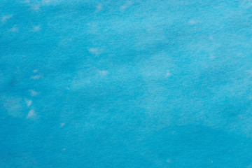  blue watercolor pastel painted on paper background texture